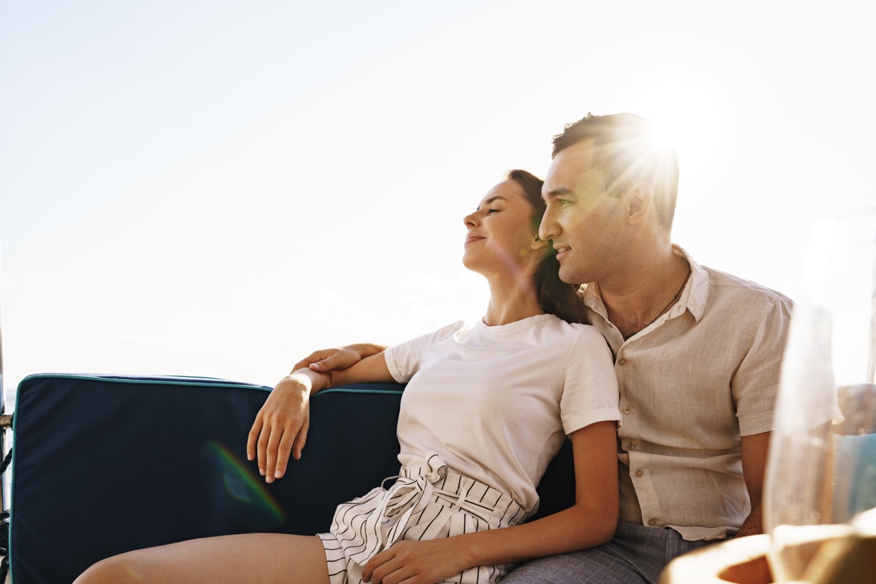 happy-couple-on-a-yacht-in-summer-on-romantic-vaca-2022-01-18-23-58-43-utc Large